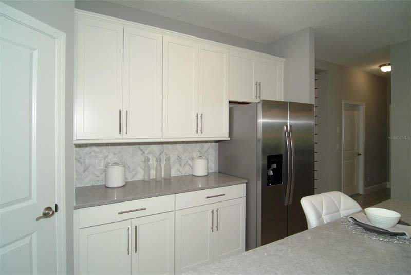 4 bedroom Single Family Residence at 5559 Nickerbean Street, Crossroads At Kelly Park, Apopka — photo 5