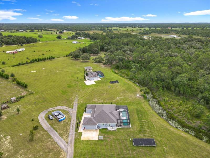 5 bedroom Single Family Residence at 10220 & 10224 BAY LAKE ROAD, GROVELAND FARMS 09-23-24, GROVELAND — photo 4