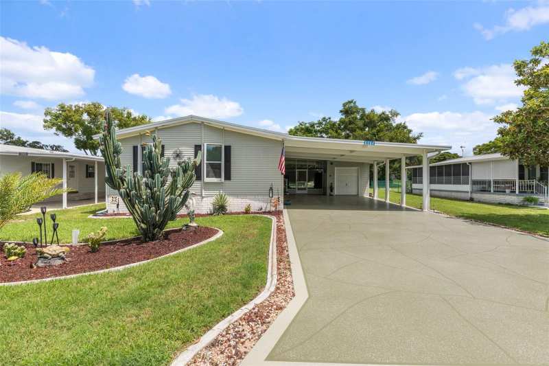 3 bedroom Manufactured Home at 8084 Little Tee Lane, High Point Mh Sub, Brooksville — photo 1