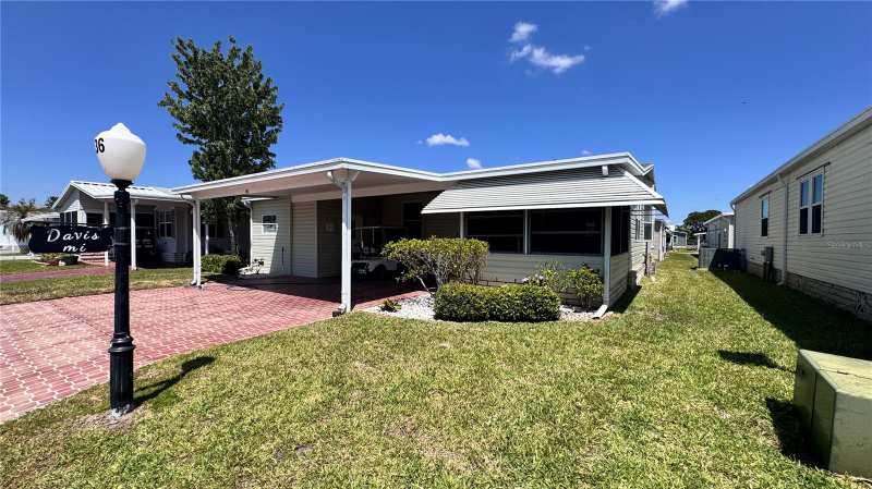 2 bedroom Manufactured Home at 236 Ramsgate Way, Sweetwater Golf & Tennis Club, Haines City — photo 1