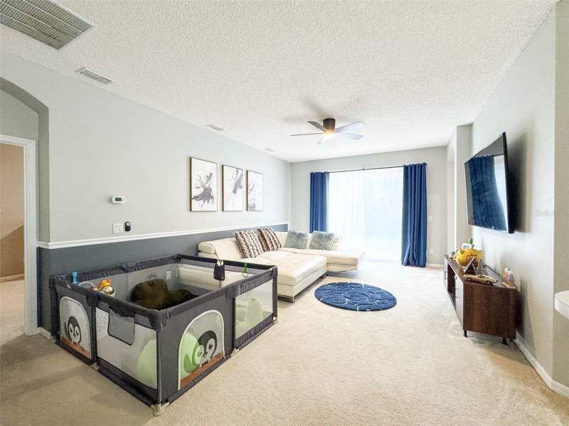 4 bedroom Single Family Residence at 1207 ROYAL SAINT GEORGE DRIVE, KENSINGTON AT EASTWOOD, ORLANDO — photo 4