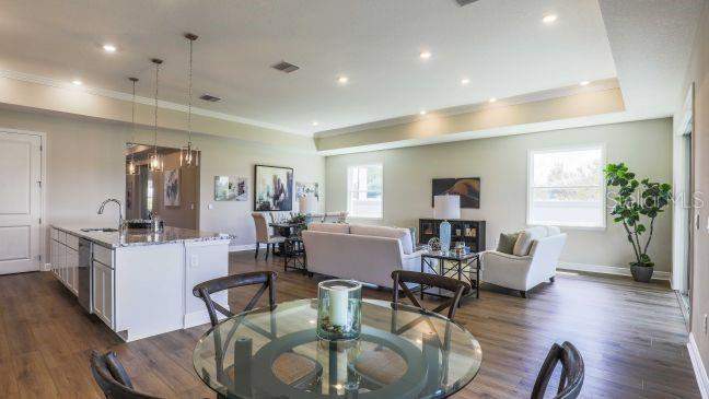 4 bedroom Single Family Residence at 930 BUCKEYE DRIVE, RESERVE AT HAMMOCK OAKS, LADY LAKE — photo 5