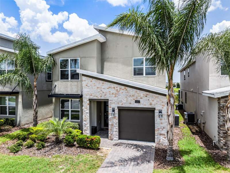 5 bedroom Single Family Residence at 661 Drop Shot Drive, Championsgate, Stoneybrook, Davenport — photo 4
