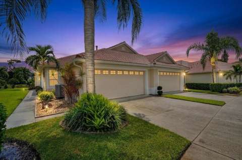 5037 Whispering Oaks Drive, waterfront for sale in North Port