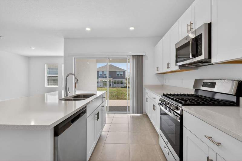 4 bedroom Single Family Residence at 217 Streamwater Way, Waterstone, Groveland — photo 3