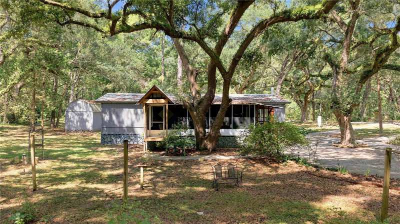 2 bedroom Manufactured Home at 7850 NE 178th Terrace, Raleigh Oaks, Williston — photo 1