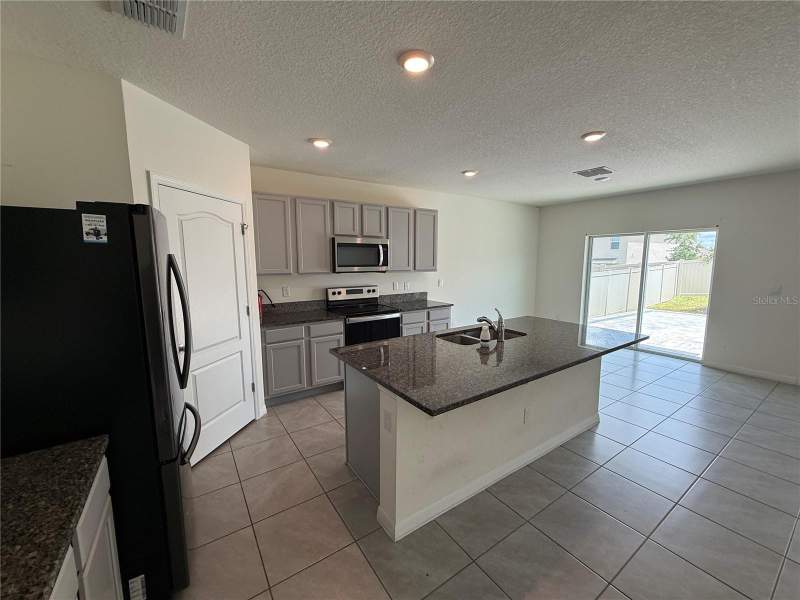 5 bedroom Single Family Residence at 2029 MAPLE RIDGE DRIVE, WESTRIDGE PARK, ZELLWOOD — photo 4
