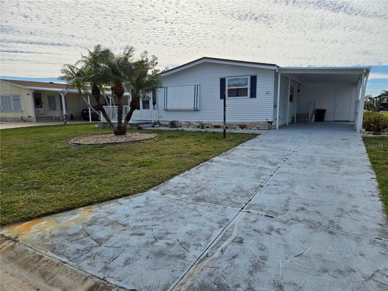 2 bedroom Manufactured Home at 8479 Tanaka Drive, Lemon Bay Isles Ph 03, Englewood — photo 1