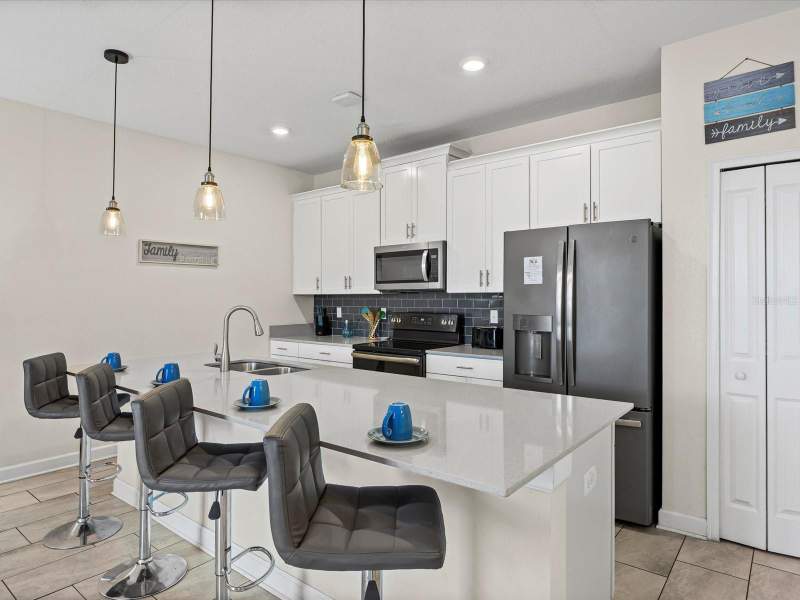 4 bedroom Townhouse at 8991 Stinger Drive, Stoneybrook South Ph J-2 & J-3, Davenport — photo 5