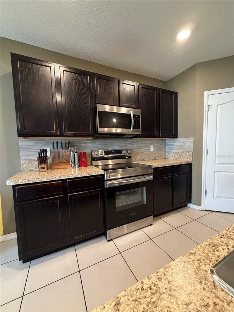 5 bedroom Single Family Residence at 1876 Cassidy Knoll Drive, Kindred Ph 1E, Kissimmee — photo 4