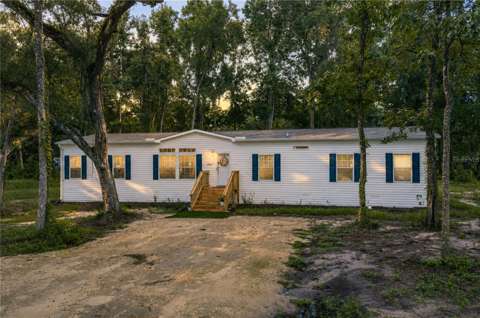 11957 SW 35Th Street, $300k–$500k for sale in Webster