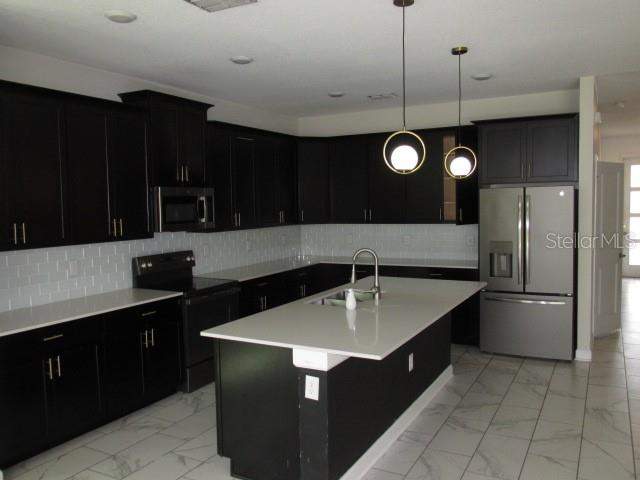 6 bedroom Single Family Residence at 8982 Cabot Cliffs Drive, Stoneybrook South North Prcl Ph 2, Davenport — photo 3
