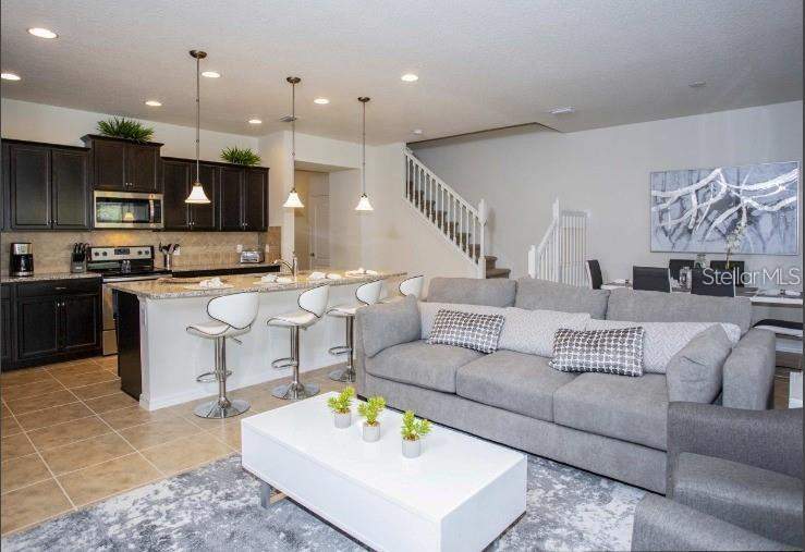 5 bedroom Townhouse at 8875 Geneve Ct, Windsor At Westside Ph 2B, Kissimmee — photo 5