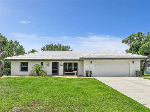 7651 Limonia Drive, home for sale in Indian Lake Estates 33855