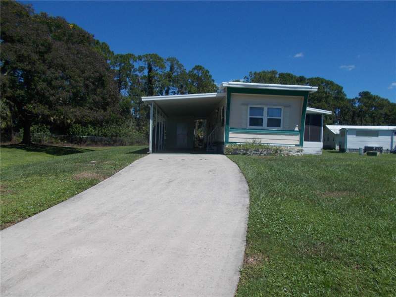 2 bedroom Mobile Home at 6384 Charm Court, Holiday Park, North Port — photo 2