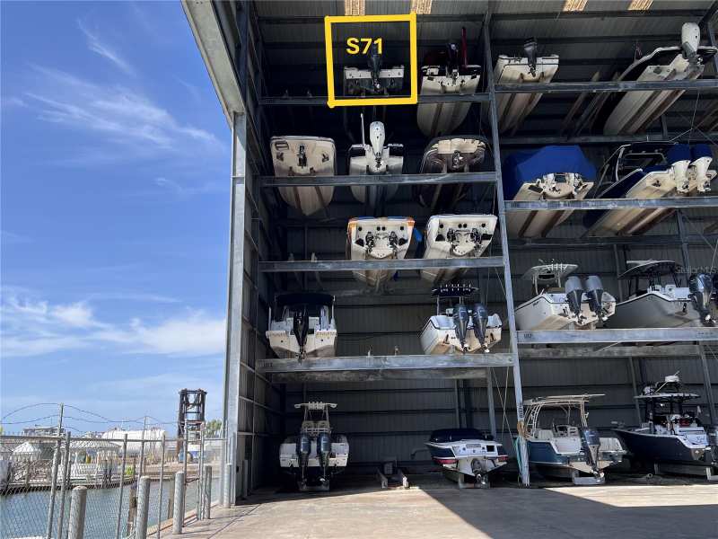 bedroom Dock-Rackominium at 100 Circuit Road #S71, Gulf Harbor Marina, Nokomis — photo 1