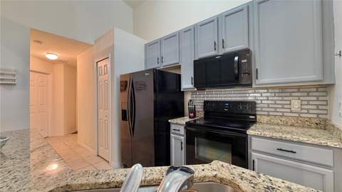 2513 Dharma Circle, Kissimmee FL - photo 7 of 31