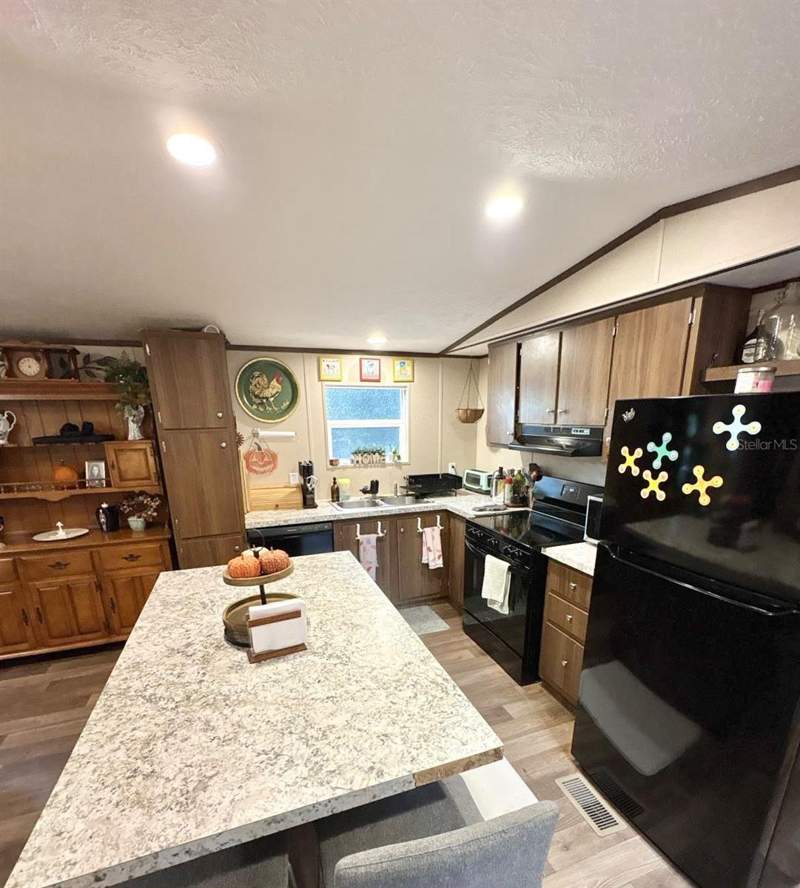 4 bedroom Manufactured Home at 10760 NE 114th Street, University Oaks, Archer — photo 2