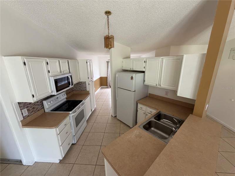 3 bedroom Single Family Residence at 8061 WINDY HILL WAY, GROVE HILL UNIT 2, ORLANDO — photo 4