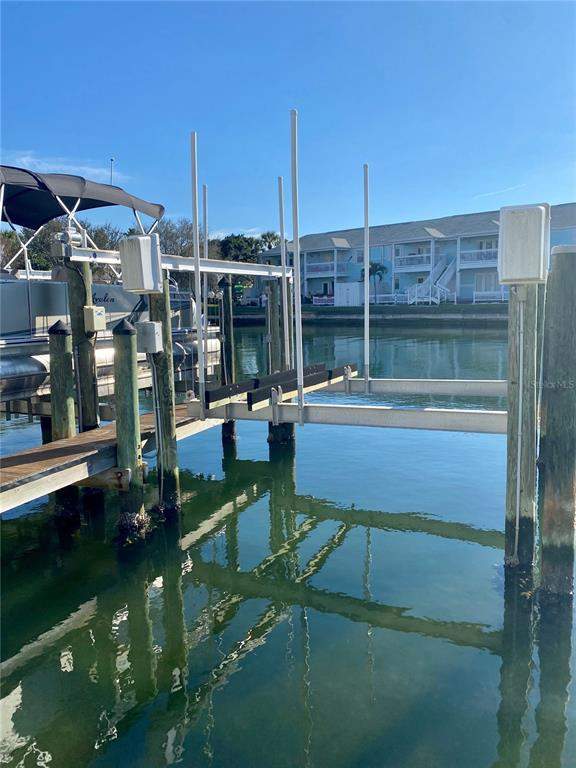 bedroom Dock-Rackominium at 0 Starfish Drive #0, Waterside At Coquina Key Dock Condo, St Petersburg — photo 4