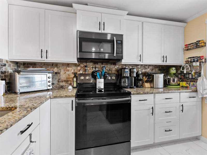 2 bedroom Condominium at 4237 Redcliff Place #-, Gardens Beacon Square, New Port Richey — photo 4