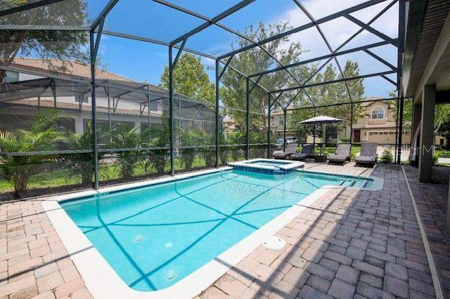 7 bedroom Single Family Residence at 9101 El Caro Lane, Stoneybrook South Ph 1, Davenport — photo 4