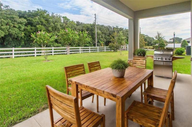 4 bedroom Single Family Residence at 5208 Meadow Song Drive, Spring Creek, Okahumpka — photo 5