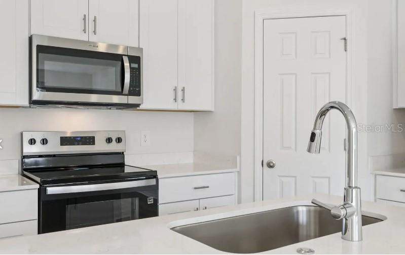 3 bedroom Townhouse at 16261 BIRD OF PARADISE AVENUE, CAGAN CROSSINGS WEST, CLERMONT — photo 4