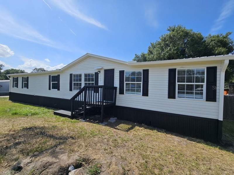 5 bedroom Manufactured Home at 5105 COUNTRYSIDE COURT, COUNTRYSIDE, ST CLOUD — photo 1