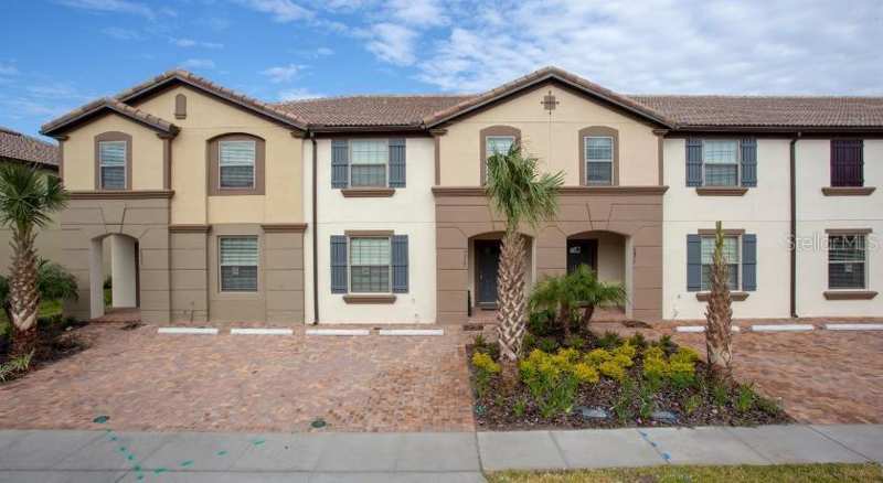 5 bedroom Townhouse at 8879 Geneve Court, Windsor At Westside Ph 2B, Kissimmee — photo 1