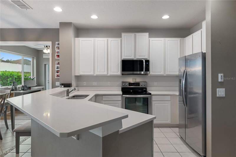 4 bedroom Single Family Residence at 1283 Legendary Boulevard, Clermont Beacon Ridge At Legends Ph 05 Lo, Clermont — photo 5