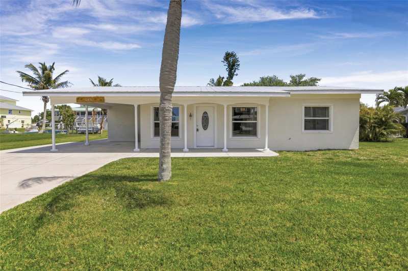 2 bedroom Single Family Residence at 10451 Marion Street, Palm Point, Englewood — photo 1