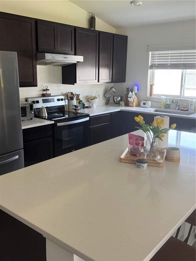 4 bedroom Single Family Residence at 1459 Geranium Drive, Gardens Ii/Lk Jackson, Mascotte — photo 5