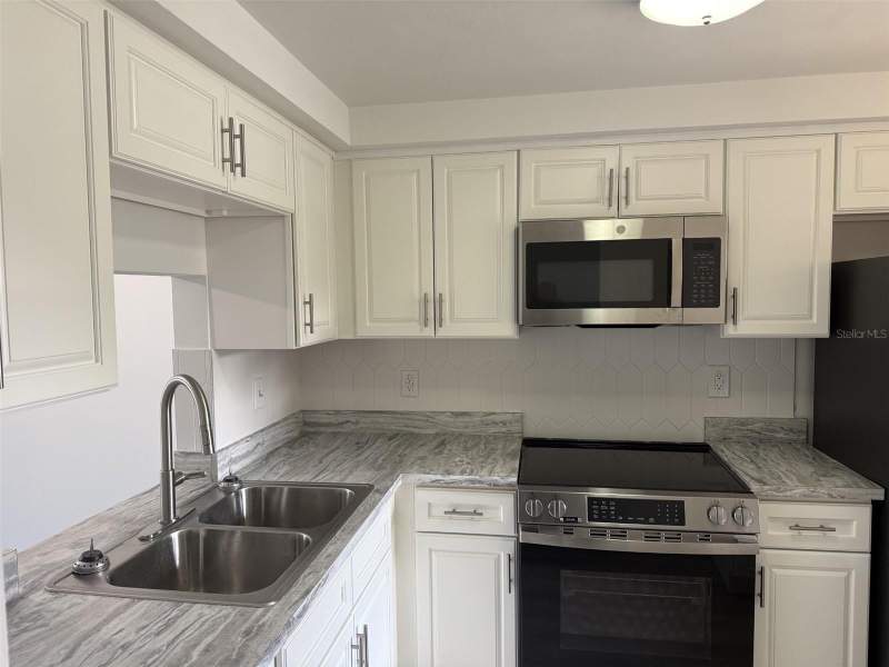 2 bedroom Condominium at 4413 Sunstate Drive #0, Gardens Of Beacon Square, New Port Richey — photo 3