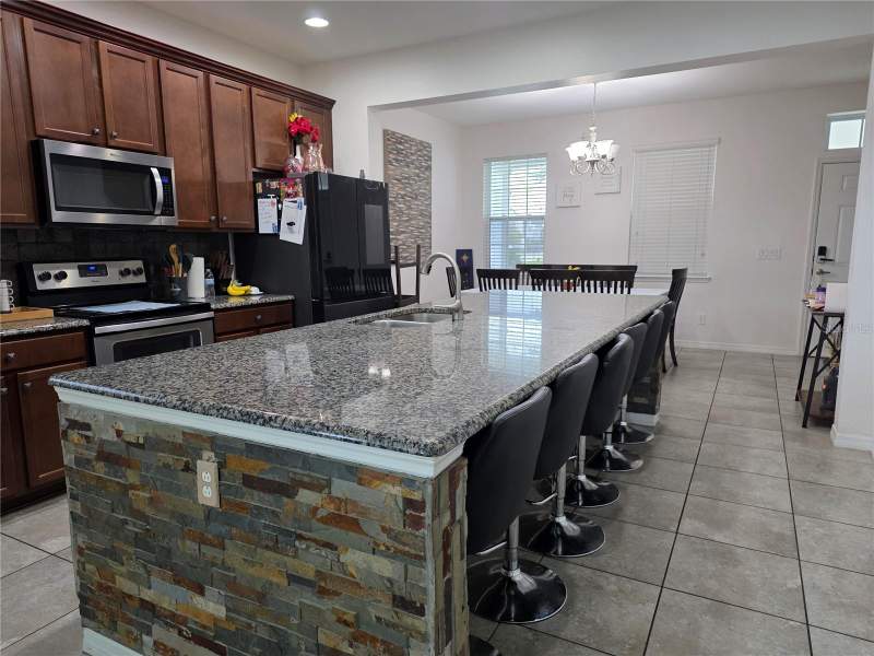 4 bedroom Single Family Residence at 12749 Garridan Avenue, Wickham Park, Windermere — photo 5