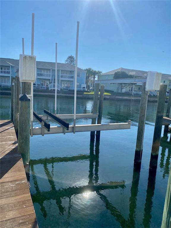 bedroom Dock-Rackominium at 0 Starfish Drive #0, Waterside At Coquina Key Dock Condo, St Petersburg — photo 2