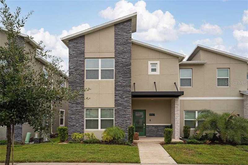 5 bedroom Townhouse at 8967 Cabot Cliffs Drive, Stoneybrook South North Parcel Ph 2, Davenport — photo 1