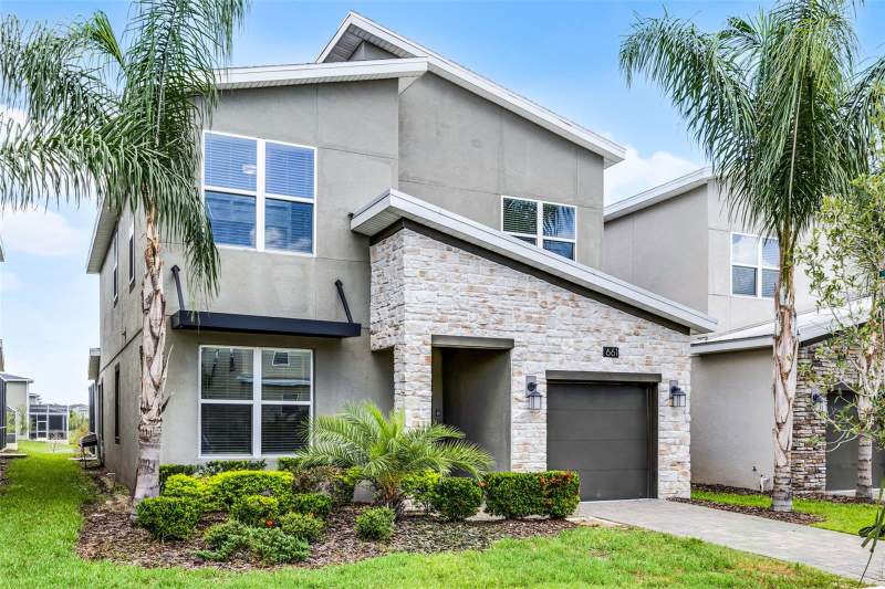 5 bedroom Single Family Residence at 661 Drop Shot Drive, Championsgate, Stoneybrook, Davenport — photo 3