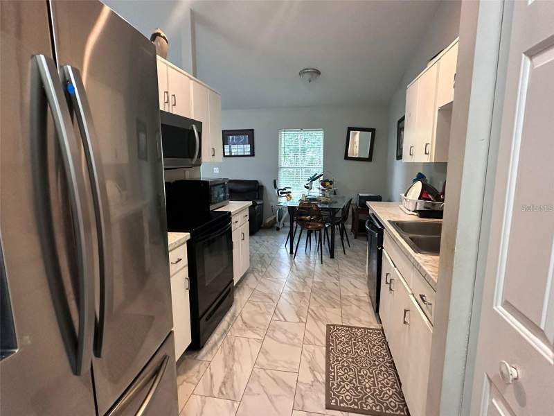 3 bedroom Single Family Residence at 1021 Embrun Court, Poinciana Village 5 Nbhd 1, Kissimmee — photo 2