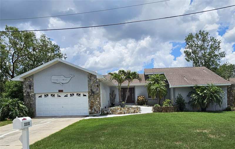 4 bedroom Single Family Residence at 2210 Bayou Drive, Baileys Bluff Estates, Holiday — photo 1