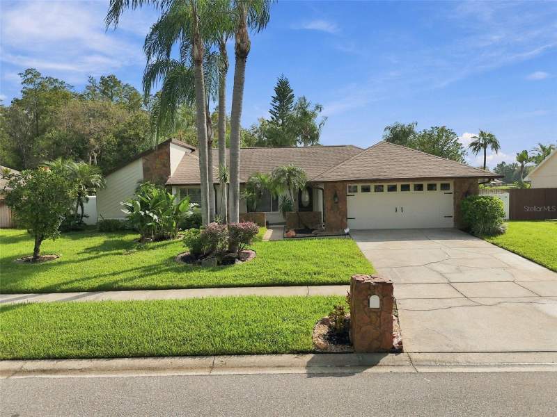 4 bedroom Single Family Residence at 15113 Alexis Drive, Carrollwood Spgs Unit 3, Tampa — photo 2