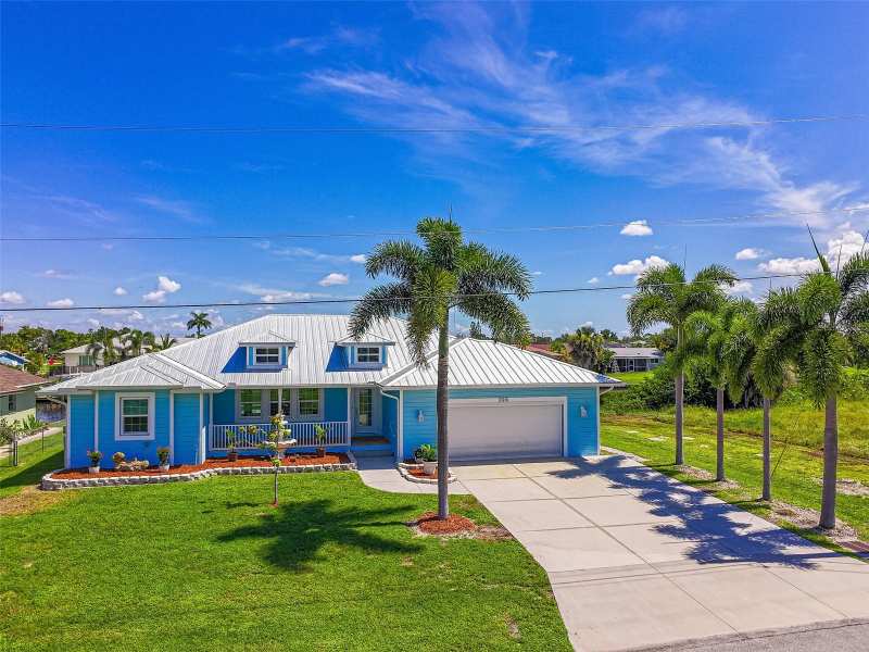 4 bedroom Single Family Residence at 206 S Waterway Drive, Port Charlotte Sec 005, Port Charlotte — photo 1