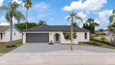 1016 Fuchsia Drive, $300k–$500k for sale in Holiday