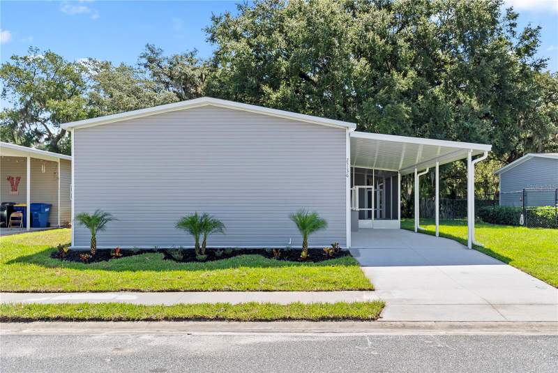 4 bedroom Manufactured Home at 25136 Huckleberry Way, Astatula Meadows Sub, Astatula — photo 2