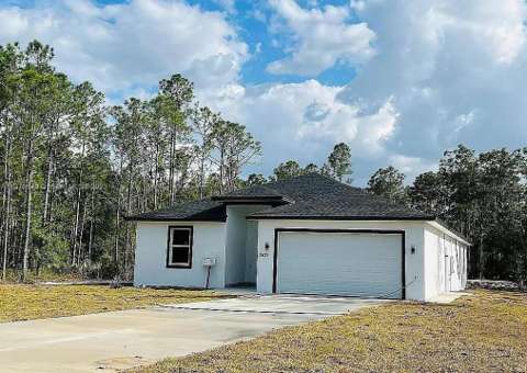 3431 Orchid Drive, home for sale in Indian Lake Estates 33855