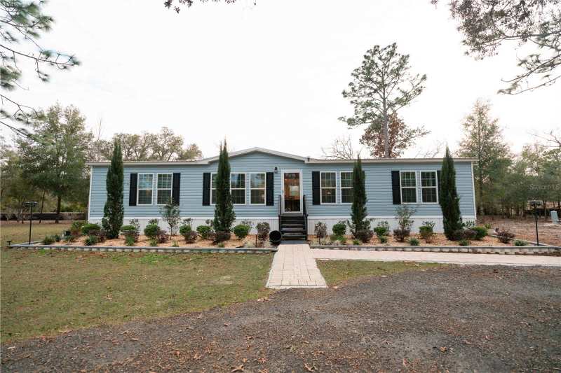 3 bedroom Manufactured Home at 7670 NE 97th Court, Bronson Heights, Bronson — photo 1