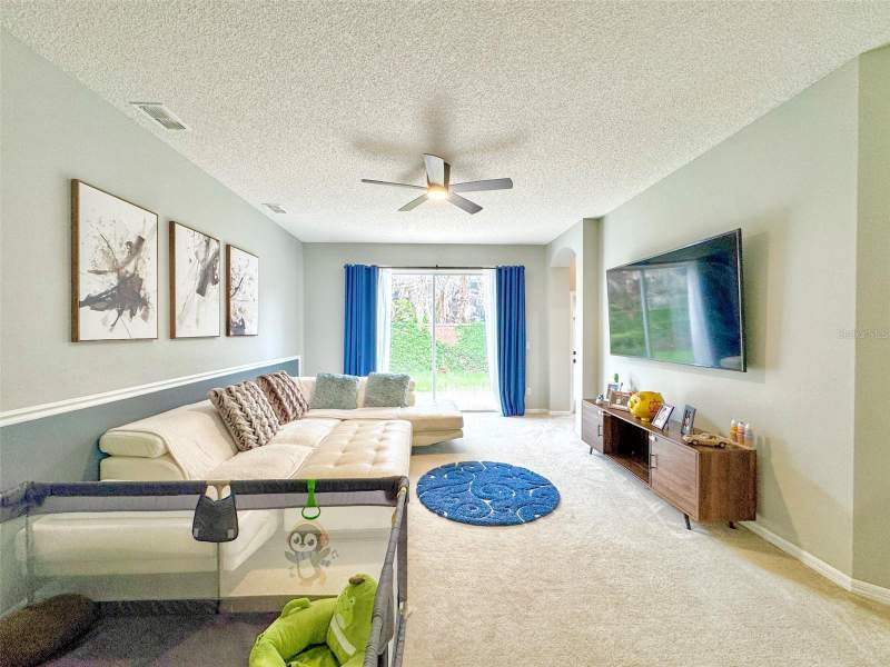 4 bedroom Single Family Residence at 1207 ROYAL SAINT GEORGE DRIVE, KENSINGTON AT EASTWOOD, ORLANDO — photo 2