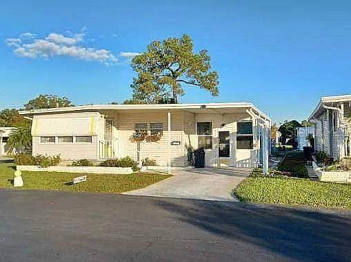 2 bedroom Mobile Home at 7880 54TH AVENUE #106, CLUB CHALET UNREC MHP, ST PETERSBURG — photo 1