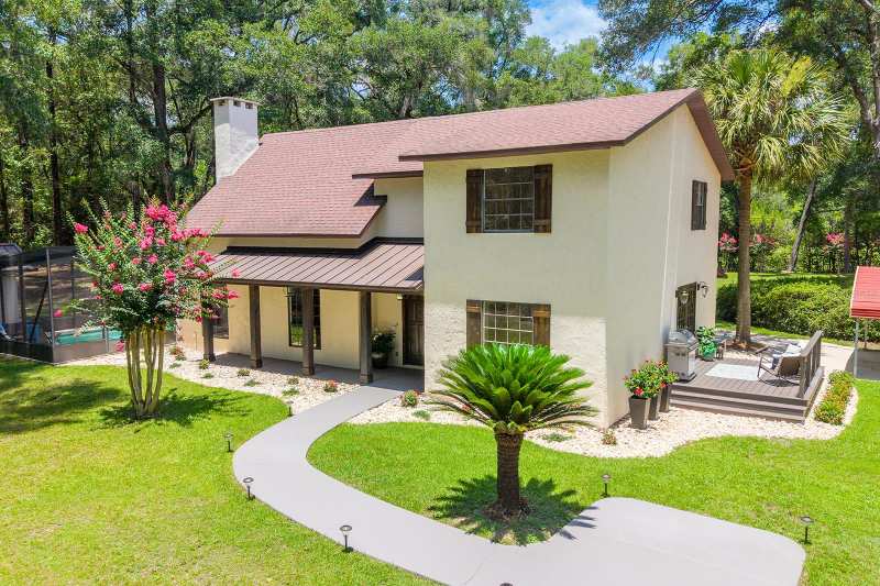 5 bedroom Single Family Residence at 22110 SW 15th Avenue, Hunt Estates, Newberry — photo 1