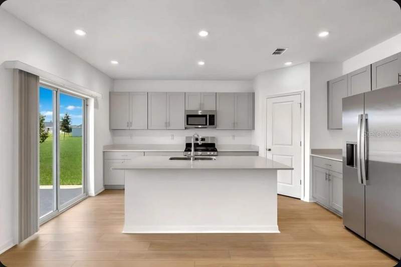 4 bedroom Single Family Residence at 7409 Fieldstone Drive, Waterstone, Groveland — photo 2
